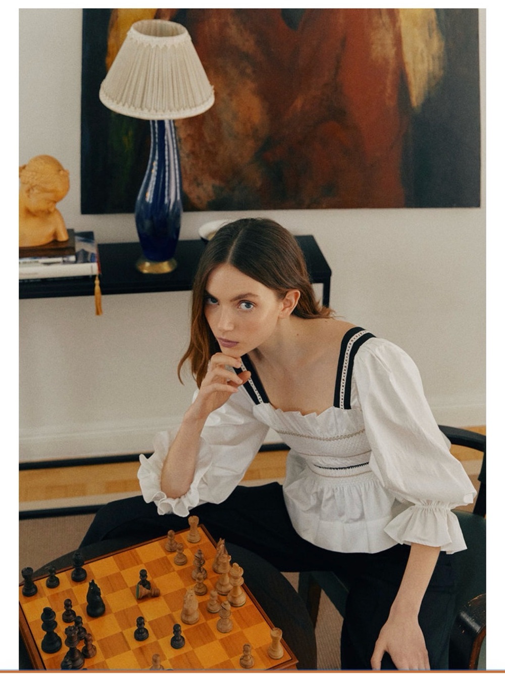 White Puff-Sleeve Peasant Top with Black Strap Accents